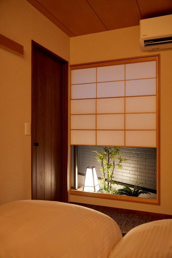 古今 天下茶屋 With A Private Parking Lot And A Half Open-Air Bath And Direct To Kix Villa โอซาก้า ภายนอก รูปภาพ